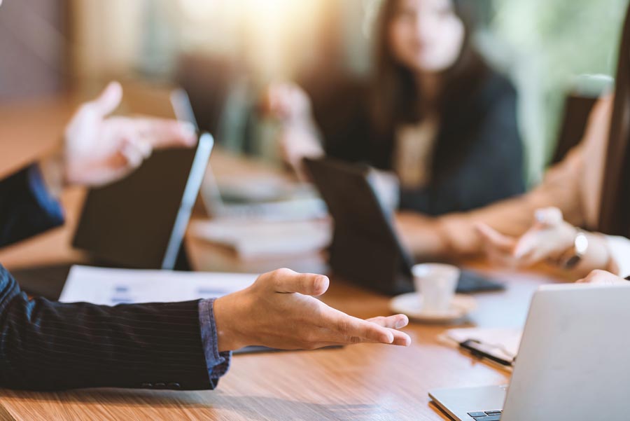 Business people meeting and planning business strategies togethe